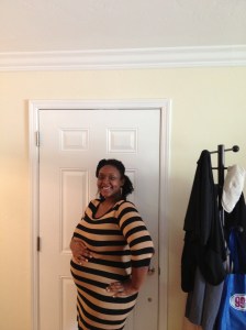 28 weeks and 1 day After forcing my brother to take this picture over and over because I thought he was taking unflattering pics of me I realized OMG I am  JUST that big.