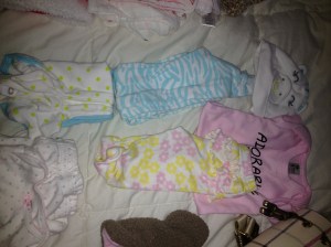 Clothing: my mother is buying her take home outfit so I brought just a few things.  Adorable baby shirt and pink pants to take her matching picture with dad, 1 NB and 1 0-3 month sleeper, 1 0-3 month outfit.  I also packed two pairs of socks, 2 pairs of mittens, and 2 hats.